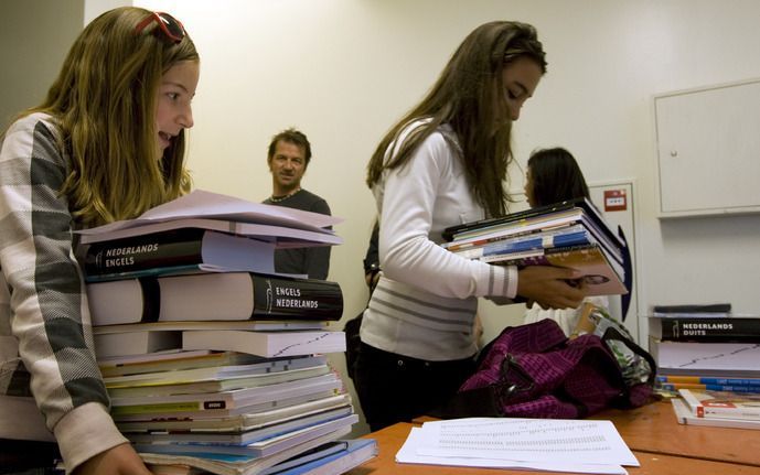 DEN HAAG – Het kabinet wil toch een fusietoets opleggen aan scholen die samengaan, ondanks kritiek daarop van de Raad van State. Foto ANP