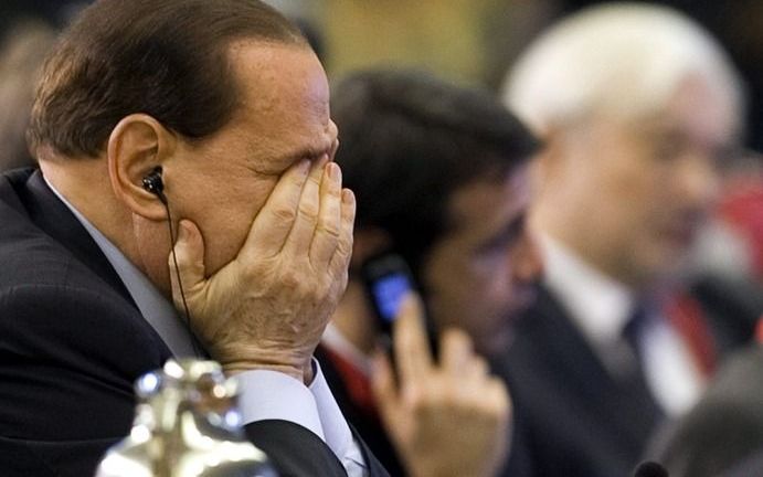 De Italiaanse premier Silvio Berlusconi tijdens de voedseltop. Foto EPA