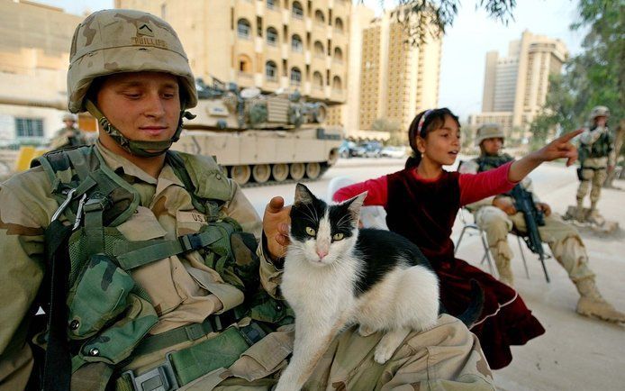 Amerikaanse soldaten in de straten van Bagdad. Foto EPA