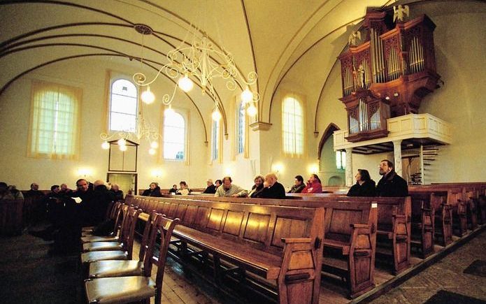 Een halflege kerk. „We lijden allen aan de kaalslag die de secularisatie in de kerken veroorzaakt.” Foto ANP