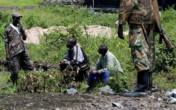 FDLR-rebellen nabij de Oost-Congolese stad Goma, 2004. Vooral de FDLR spint garen bij de illegale export van goud.