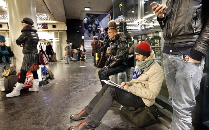 Gestrandde reizigers op Amsterdam Centraal. Foto ANP