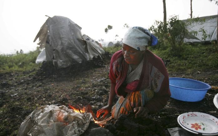 Gevluchte vrouw in Congo. - Foto EPA