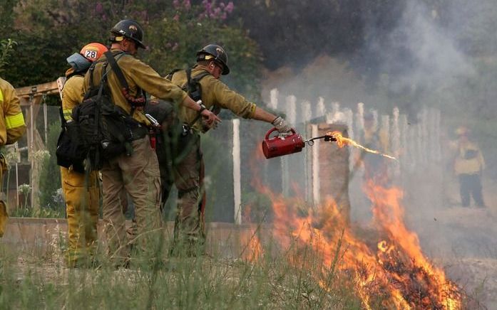 Brandweer krijgt meer grip op bosbranden bij Los Angeles. Foto ANP