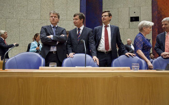 Minister Bos, Premier Balkenende en Minister Rouvoet bij aanvang van de Algemene Beschouwingen. Foto ANP