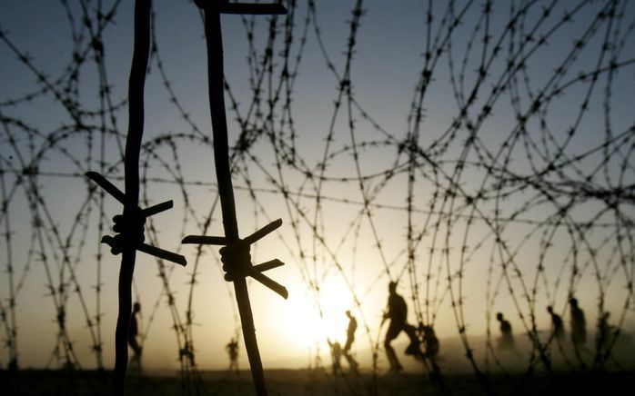 SEOUL - Door de oorlog zijn duizenden families door prikkeldraad en mijnenvelden van elkaar gescheiden. Foto ANP