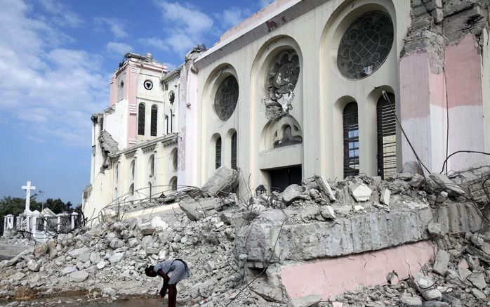 PORT AU PRINCE - Puinhopen van de aardbeving in Haïti. De Verenigde Naties hebben donderdag een recordbedrag van 1,44 miljard dollar (1,05 miljard euro) gevraagd voor hulp aan het land. Foto EPA