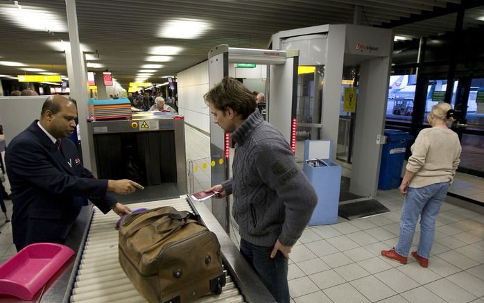 Bagagecontrole Schiphol. Foto ANP