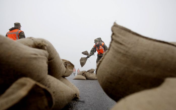 WARSCHAU – Door overstromingen in het zuiden van Polen zijn maandag zeker twee mensen om het leven gekomen. Foto ANP