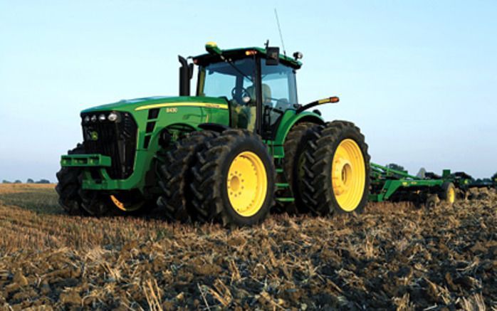 De Amerikaanse fabrikant van tractors en combines John Deere heeft woensdag zijn winstverwachting voor het gehele boekjaar naar boven bijgesteld. Foto John Deere