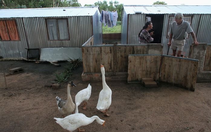 Bewoners van een plakkerskamp, op 20 kilometer van Pretoria. beeld VidiPhoto