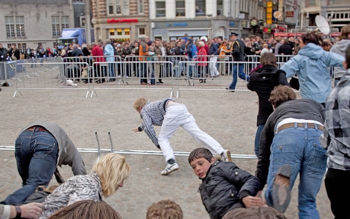 Paniek op de Dam tijdens dodenherdenking op 4 mei. Foto ANP