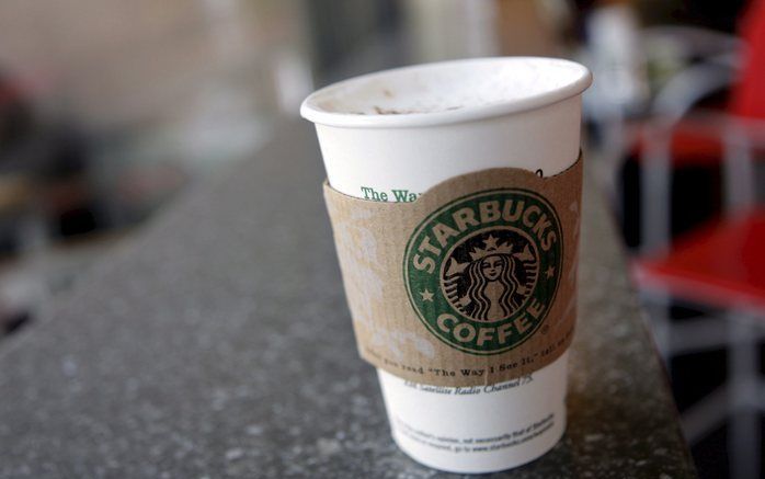 Starbucks gaat dit jaar minder nieuwe filialen openen dan gepland. Bovendien sluit de keten honderd onrendabele Amerikaanse verkooppunten. Foto ANP