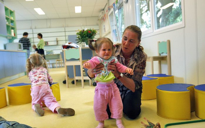 AMSTERDAM - Moeders stoppen steeds minder vaak met werken als ze kinderen krijgen. In tien jaar tijd zijn ze ook 50 procent meer gaan werken. Foto ANP