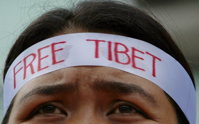 FILIPIJNEN - Een Filipijnse betoger voor een vrij Tibet. Foto EPA