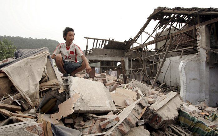 De wederopbouw na de zware aardbeving in China gaat de komende drie jaar meer dan 500 miljard yuan (46,3 miljard euro) kosten. De herstelwerkzaamheden zorgen wel voor een sterkere groei van de Chinese economie. Foto EPA