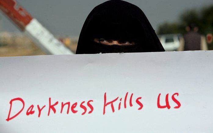 Een Palestijnse vrouw protesteert tegen de Israelische blokkades in de Gazastrook. Foto EPA