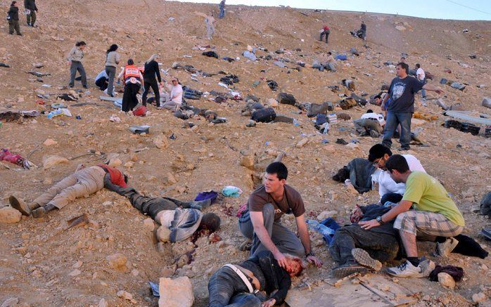 De bus met Russische toeristen was op weg naar de zuidelijke kustplaats Eilat toen het in een ravijn 80 meter naar beneden stortte. Foto EPA