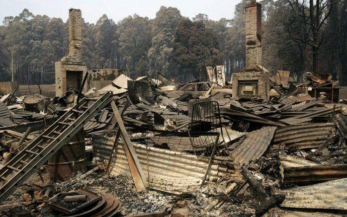 De Australische overheid heeft donderdag beloofd de invoering van een telefonisch waarschuwingssysteem voor bosbranden mogelijk te maken. Foto EPA