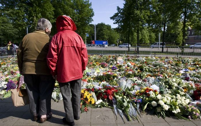 Bloemen op de rampplek in Apeldoorn. Foto ANP