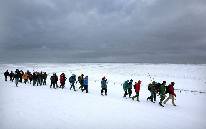 Winters wadlopen populair. Foto ANP.