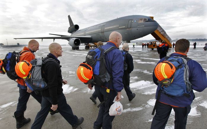 PORT–AU–PRINCE – Een team van de Nederlandse reddingsbrigade die vrijdag neerstreek in Haïti heeft zijn eerste inzet afgebroken nadat schoten waren gehoord. Foto ANP