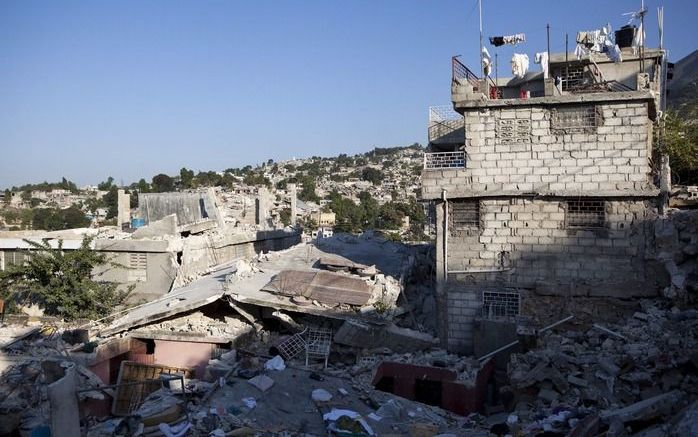 PORT-AU-PRINCE – Het onbezonnen stapelen van verdiepingen was in Haïti een belangrijke oorzaak van de grote schade. Foto EPA