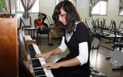 Dankzij klassieke muziek gaat er voor de leerlingen een wereld open. Beeld Yulia Mestechkin.