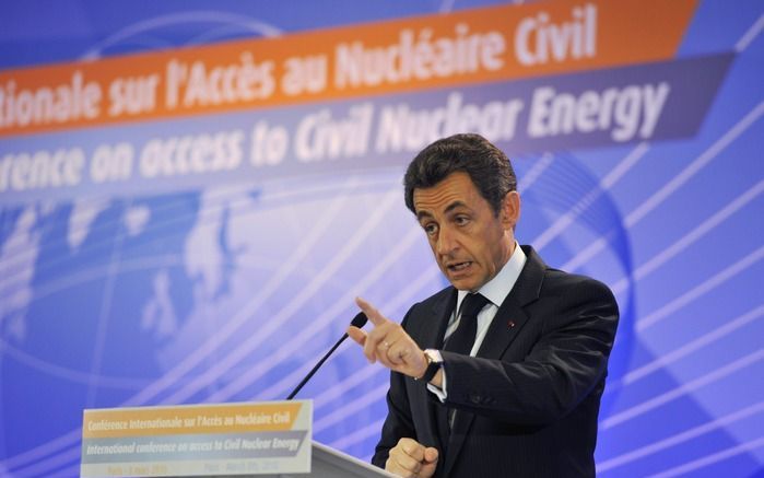 Sarkozy tijdens de opening van de conferentie. Foto EPA.