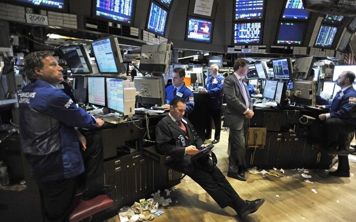 Beurshandelaars op de Dow Jones Index. Foto EPA.