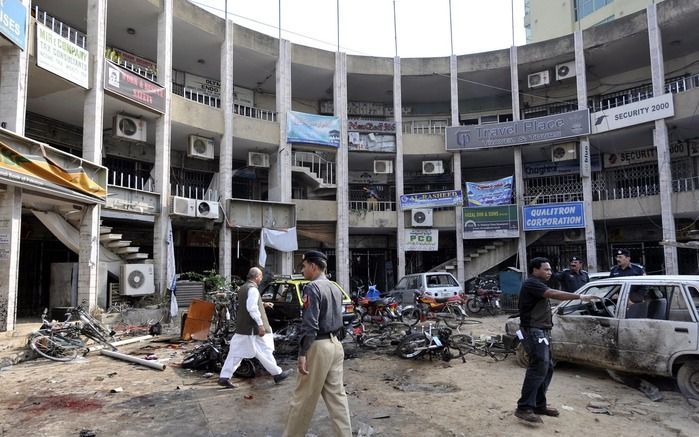 Bij een zelfmoordaanslag bij een bankgebouw in de stad Rawalpindi kwamen eerder op de dag dertig mensen om. Foto EPA