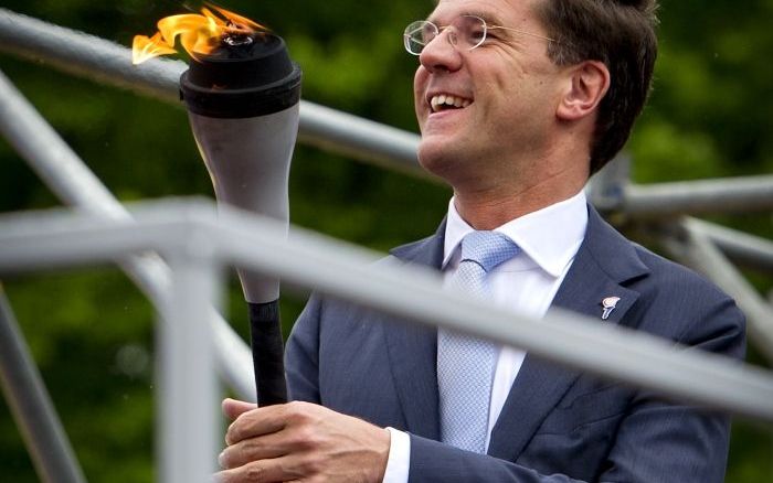 Premier Mark Rutte onsteekt het vrijheidsvuur in Breda. Foto ANP