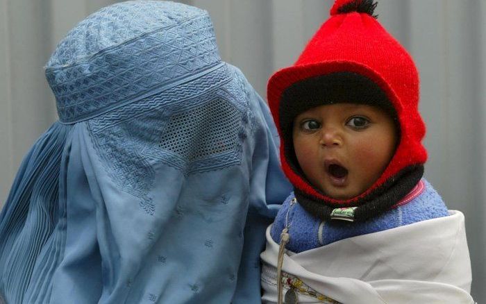 De Canadese premier Harper was gisteren boos over een nieuwe Afghaanse wet die vrouwen ondergeschikt maakt aan mannen. Foto EPA