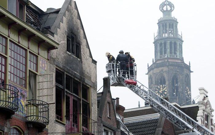 De brandweer bij het uitgebrande studentenhuis in Groningen. Foto ANP