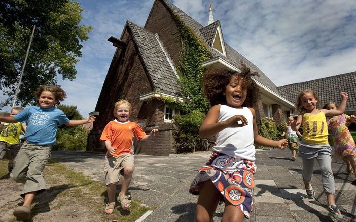 Buren van scholen en kinderdagverblijven kunnen vanaf 1 januari niet meer klagen over schreeuwende kinderen. Foto ANP