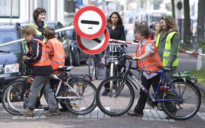 Nederlanders zullen minder vrijwilligerswerk verrichten, als de overheid minder sociale zekerheid biedt. Foto ANP