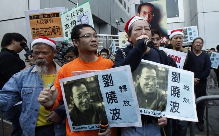 Protest tegen de gevangenisstraf van de Chinese dissident Liu Xiaobo in Hong Kong. Foto EPA