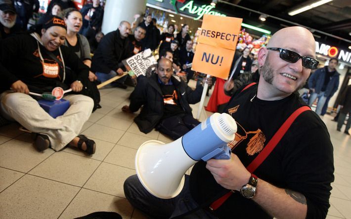 Woensdag leggen Haagse gemeenteambtenaren massaal het werk neer. Foto ANP