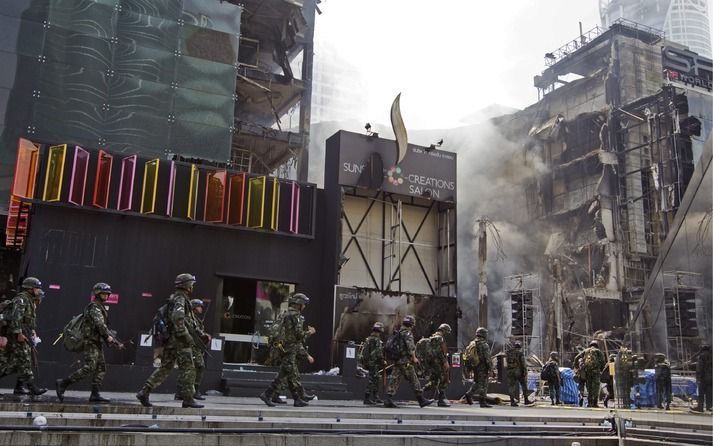 Thaise militairen patroulleerden donderdag door Bangkok. Foto EPA