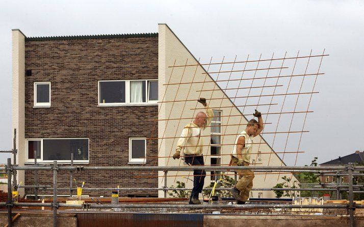 Nieuwbouwprojecten lopen onnodig vertraging op door slechte dienstverlening van gemeentenbij het afhandelen van bouwplannen. Foto ANP