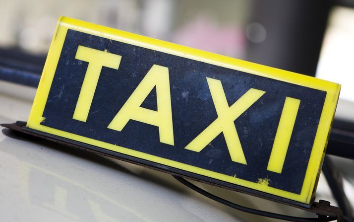 DEN HAAG - Een kwart van de erkende taxichauffeurs is bekend bij justitie. Foto ANP