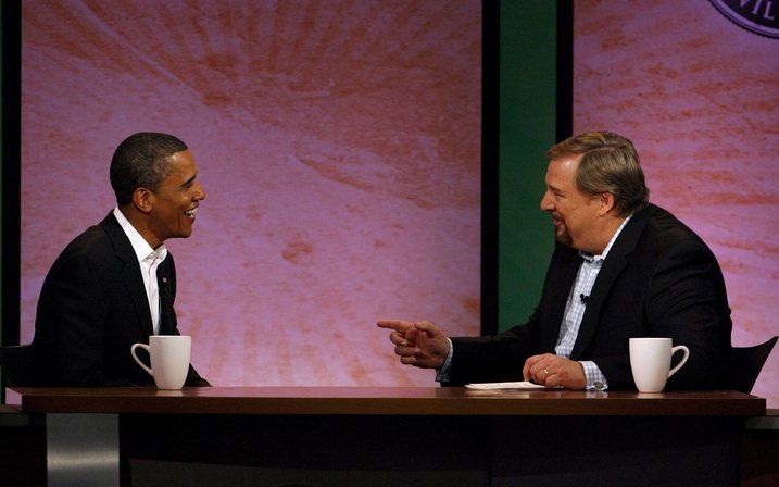 Obama in gesprek met de progressieve evangelicaal Rick Warren. Foto EPA