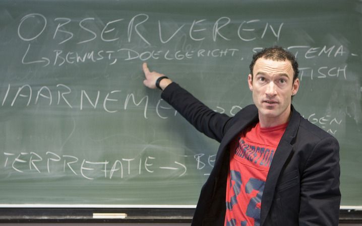 Docent voor de klas. - Foto ANP