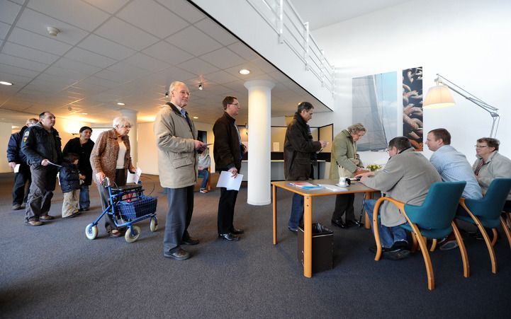 Stemmen voor de gemeenteraadsverkiezingen in Capelle aan den IJssel. Foto ANP