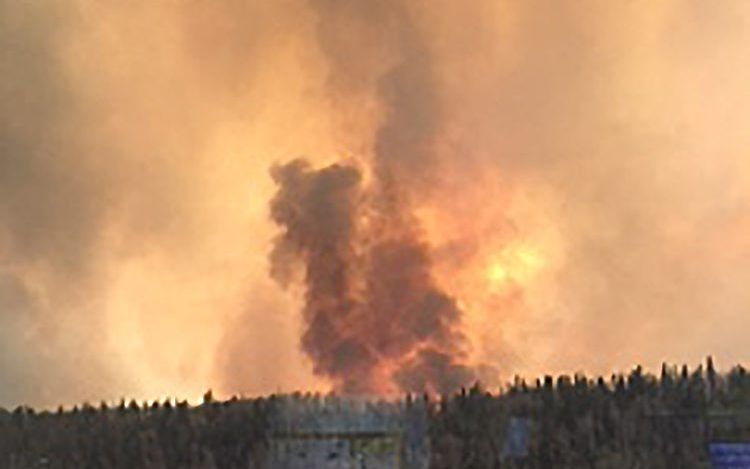 Brand bij Fort McMurray. Beeld AFP