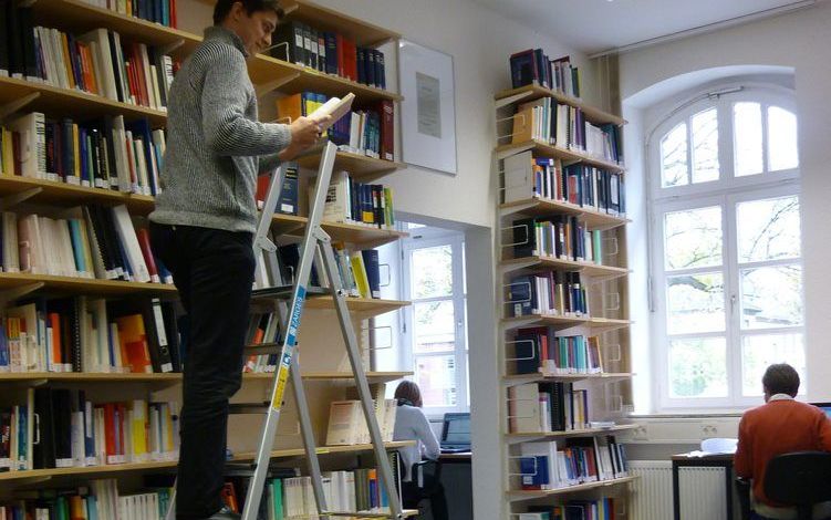 Een bibliotheek van de Wilhems-Universität te Münster. Foto Wikimedia, George Serdechny