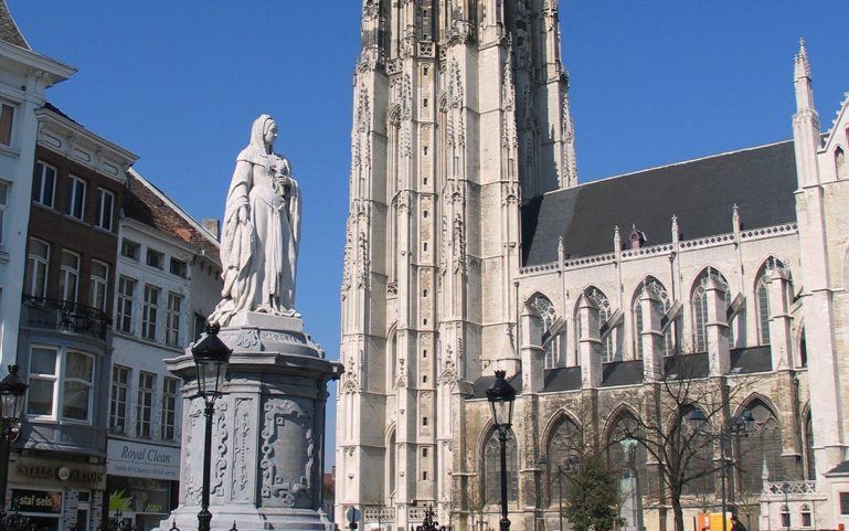 De toren van de Sint-Romboutskathedraal in Mechelen. Beeld Wikimedia