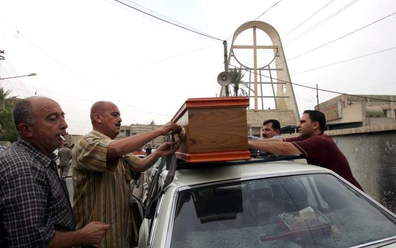 Begrafenis van omgekomen christenen na de aanslag op de kerk in Bagdad. Foto EPA