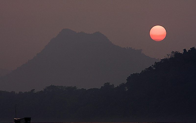 De Mekongrivier in Luang Prabang in Laos. Foto Jean-Marie Hullot, Wikimedia