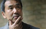 Haruki Murakami creëert in zijn boeken als het ware een postmoderne Japanse variant op het magisch realisme. beeld Ivan Gimenez / AFP
